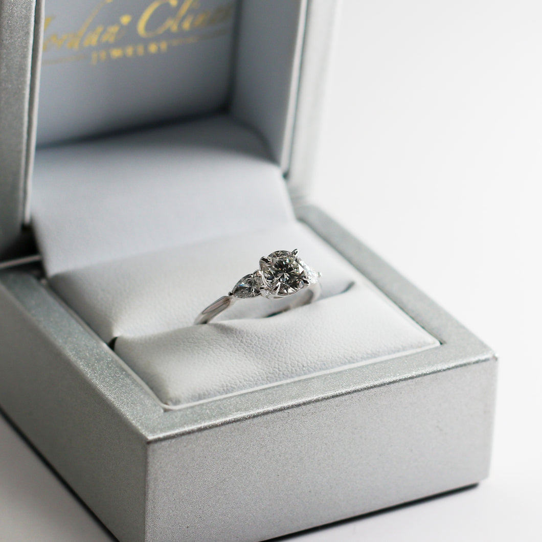 Three Stone Round and Pear Cut Diamond Ring